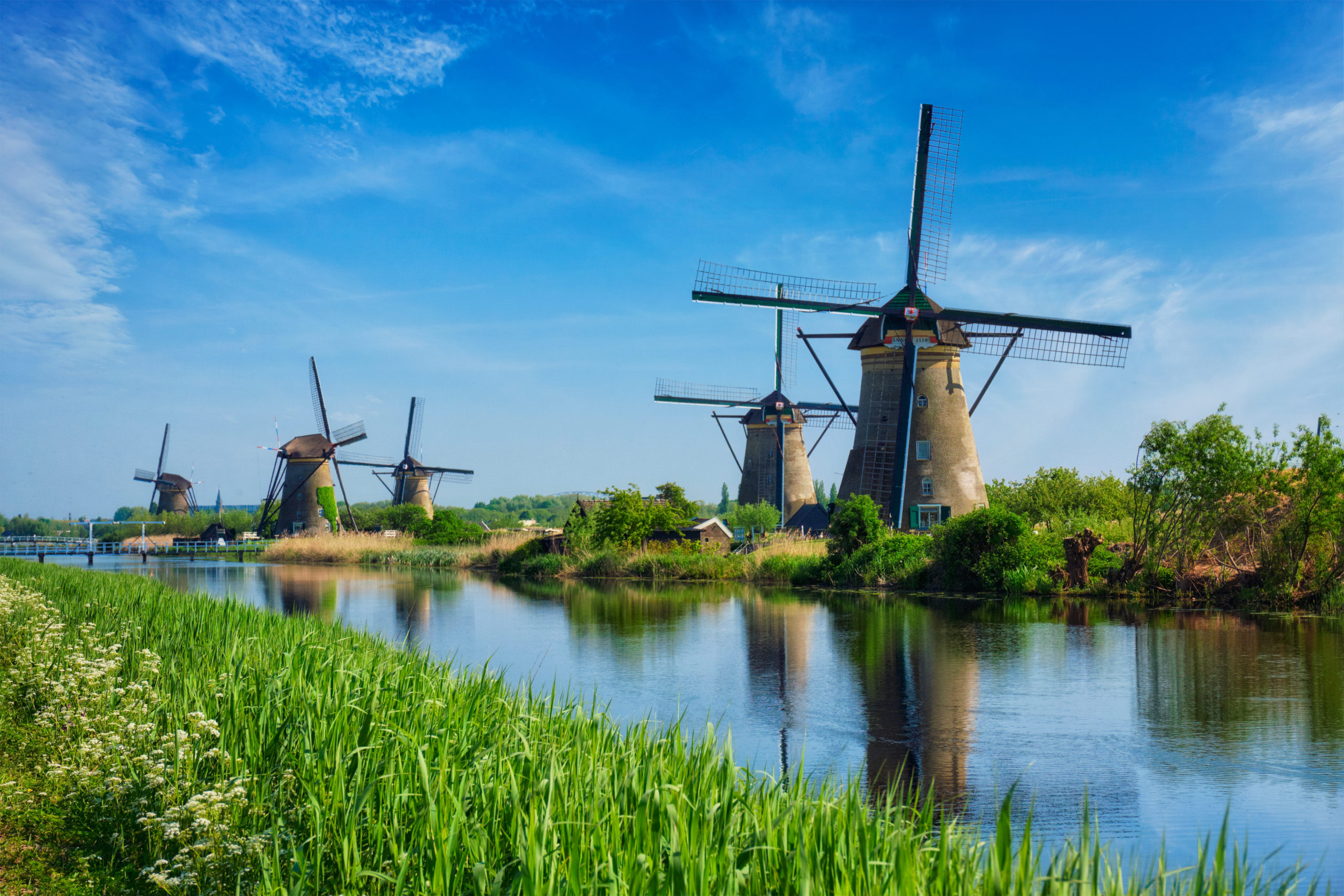 Netherlands rural lanscape with windmills at famous tourist site Kinderdijk in Holland